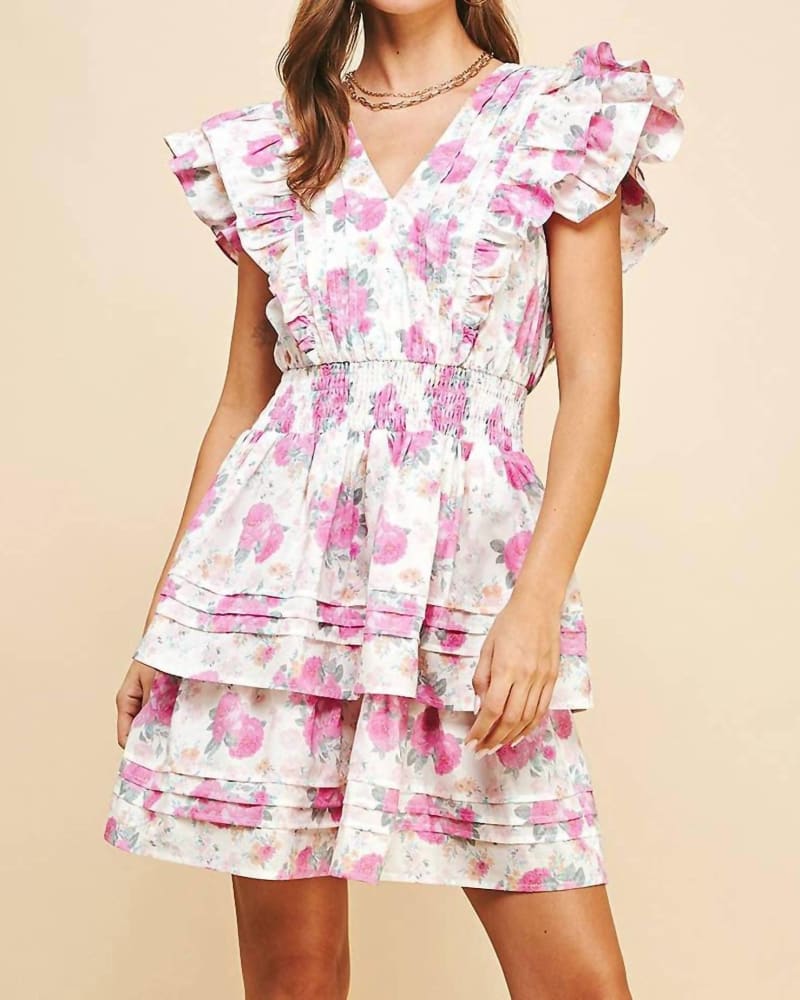 Front of a model wearing a size LARGE Wafa Floral Print Mini Dress in Multi in Multi by PINCH. | dia_product_style_image_id:340998